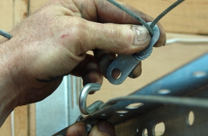 Remove the cable clip from the S-hook.