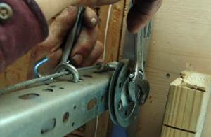 Loosen the nut from the bolt.