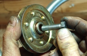 Install the new pulley.