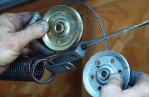 Swap the pulleys.