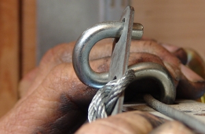 Put the cable clip on the S-hook.