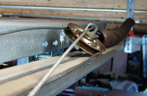 Get the extension spring on the track.