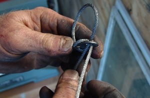 Take the cable off the clip.