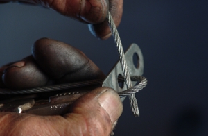 Threading the cable through the cable clip.