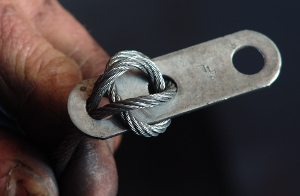 Threading the cable through the cable clip.