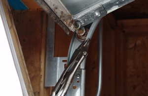 Place the vise grip on the track.